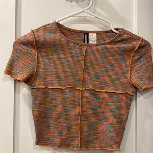 Size XS multicolored (pink green orange blue) short sleeved crop top